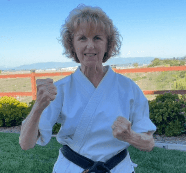 Cindy Baez in her gi and black belt